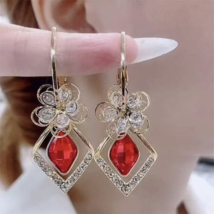 Boucles d'oreilles fleur scintillantes luxueuses