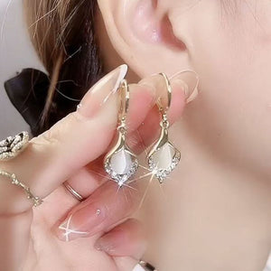 Boucles d'oreilles yeux de chat brillantes