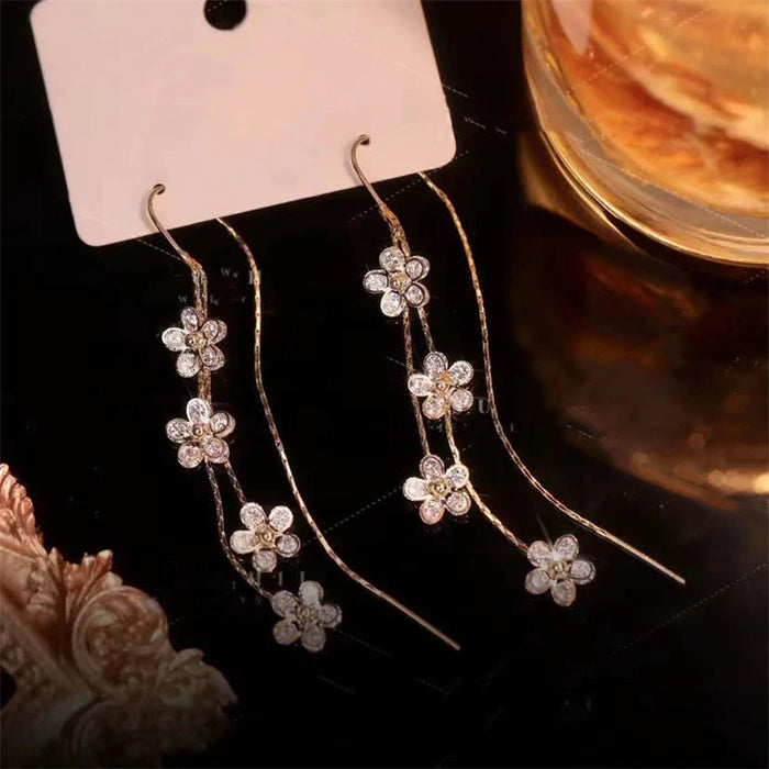 Boucles d'Oreilles Zircon Fleur de Prunier