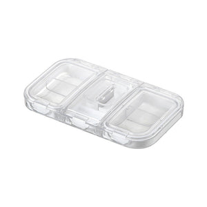 Boîte à pilules avec coupeur de médicaments