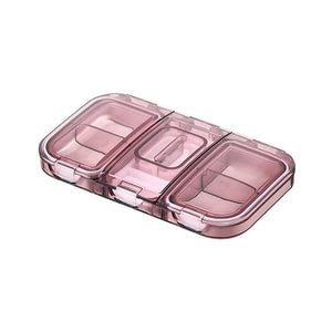 Boîte à pilules avec coupeur de médicaments