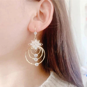 Boucles d'oreilles trois créoles lotus