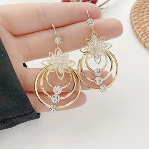 Boucles d'oreilles trois créoles lotus