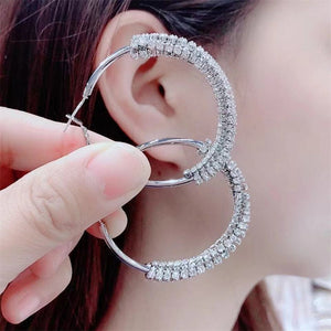 Boucles d'oreilles en forme rond à la mode