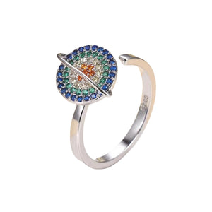 Bague planétaire pivotante en zirconium de couleur