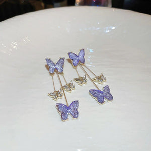 Boucles d'oreilles papillon violet