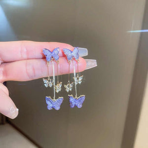 Boucles d'oreilles papillon violet